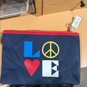C. Wonder Navy Love Clutch with Red and Blue Accents